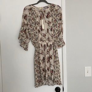 NWT beautiful floral dress! Size small.